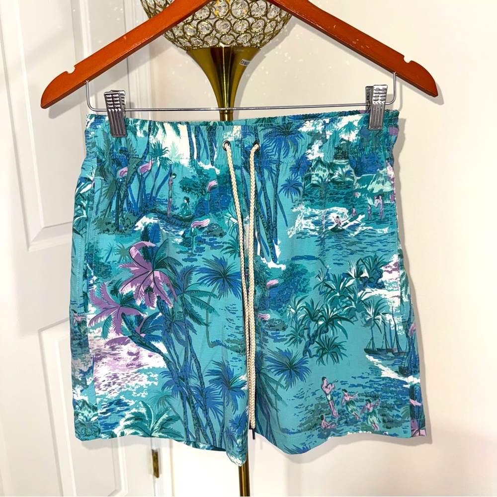 *Maui & Sons men's swim trunks in blue and purple, tropical flamingo print